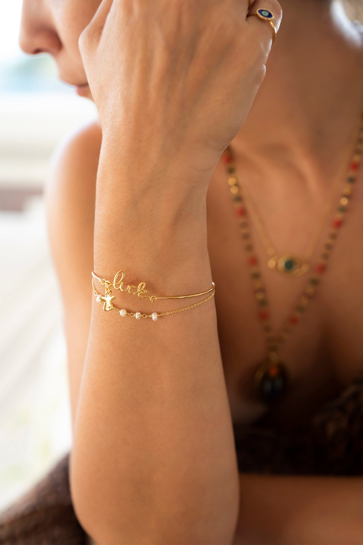 MINI LUCK – Script Bangle with Angel Charm