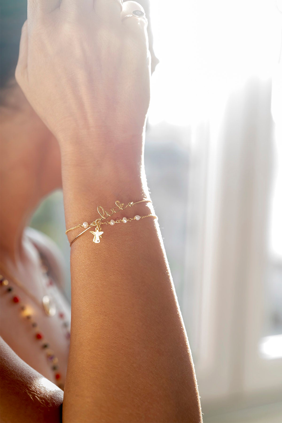 MINI LUCK – Script Bangle with Angel Charm