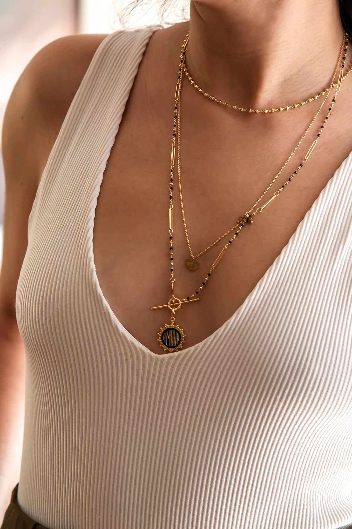 CHARMING AMOUR – Layered Gold & Black Charm Necklace Set