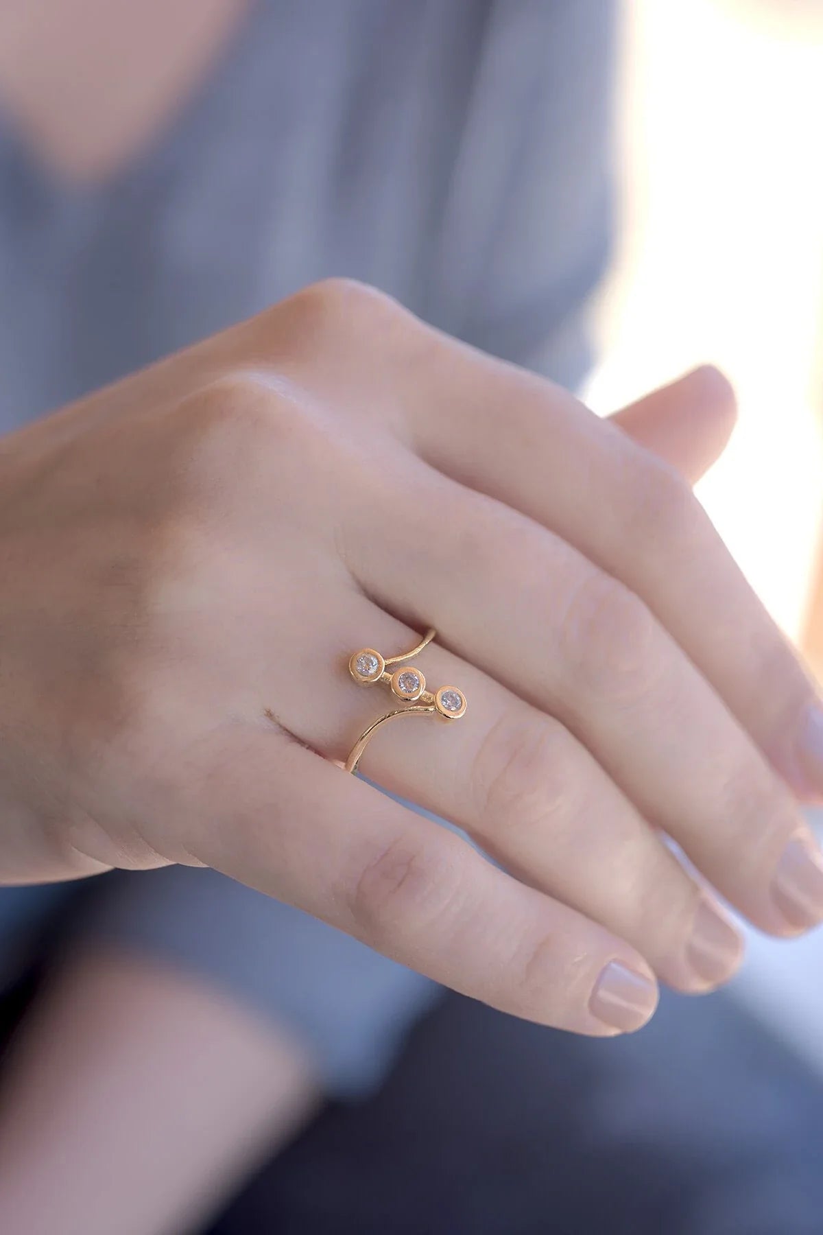 SWIRL – Three CZ Ring
